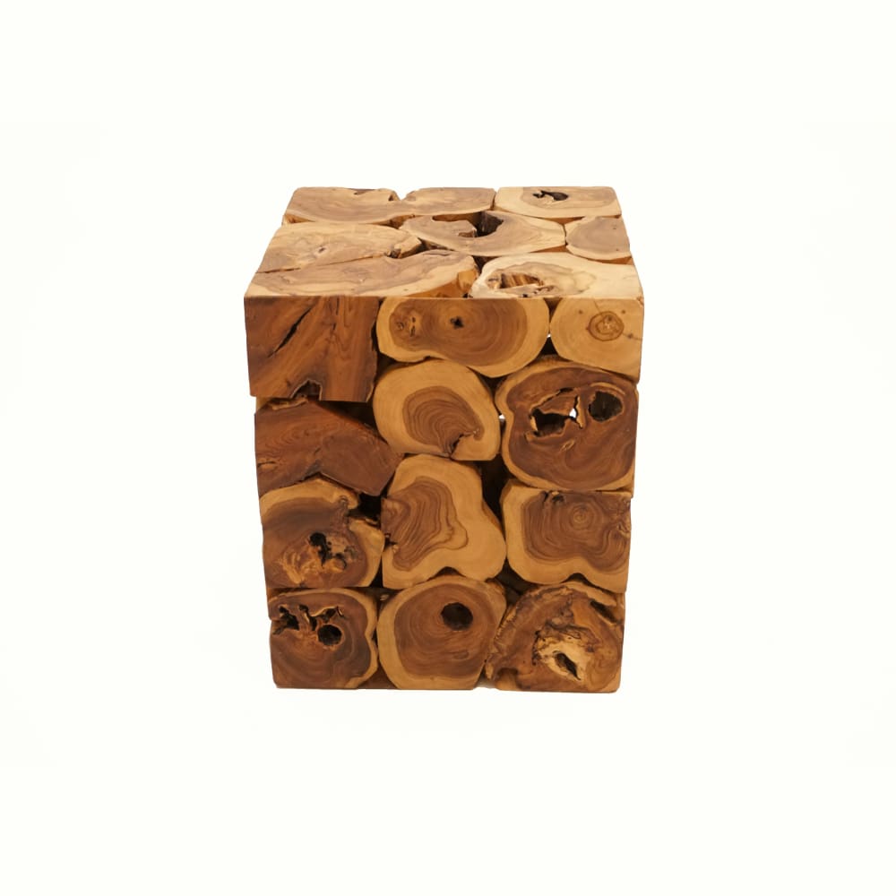 A square shaped piece of wood with various shapes and sizes.